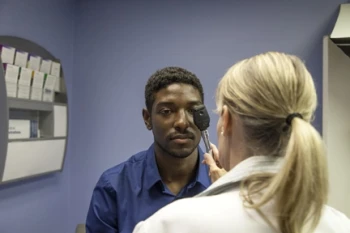 Doctor conducting research about glaucoma in African-Americans