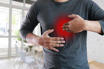 Man suffering from acid reflux (reflux acid), LPR, or GERD needing GERD doctors