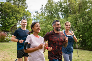 A group of runners breathing through their nose while exercising