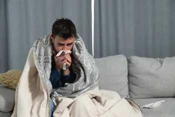 Man with either a cold or sinus infection