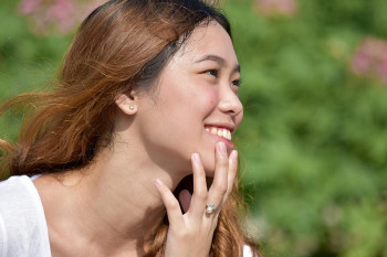 A woman thinks about why she wants facial plastic surgery.