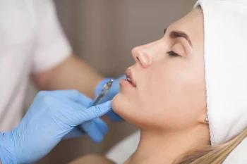 A woman about to receive cosmetic fillers.