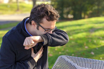 A man with a lingering cough.