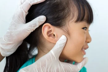 Girl with signs of ear infection
