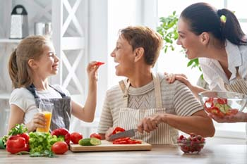 Family eating healthy food to improve their eyesight.