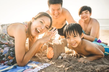 A family having fun while using healthy travel tips