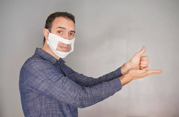 A translucent mask for hard-of-hearing people.