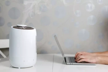 A humidifer and computer in the home of someone with dry eye