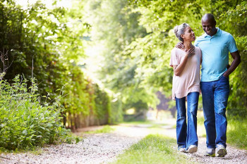 People hiking outside, watching out for ticks