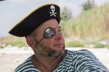 A pirate wears an eyepatch