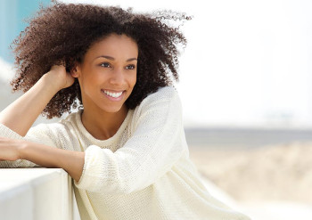 A woman thinks about the results of cosmetic injections.