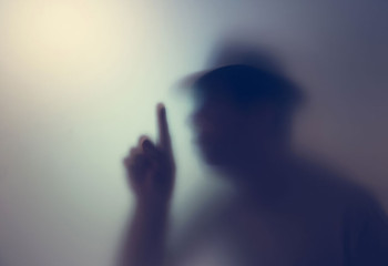 A shadowy image seen by someone with Charles Bonnet syndrome