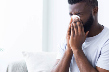 A man with a sinus headache