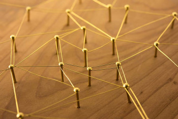 A network of strings representing links and ties