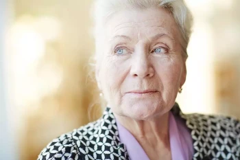A woman thinks about the risks of cataract surgery.