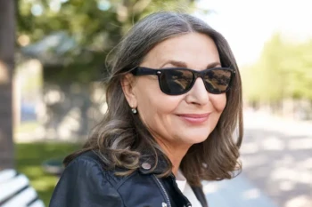Woman wearing sunglasses after cataract surgery