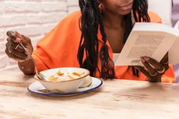 Woman eating soup to help with sinus infections
