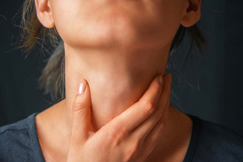 A woman has throat ulcers.