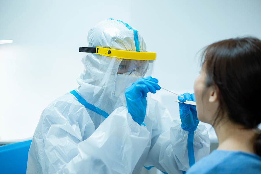 A person gets a coronavirus test