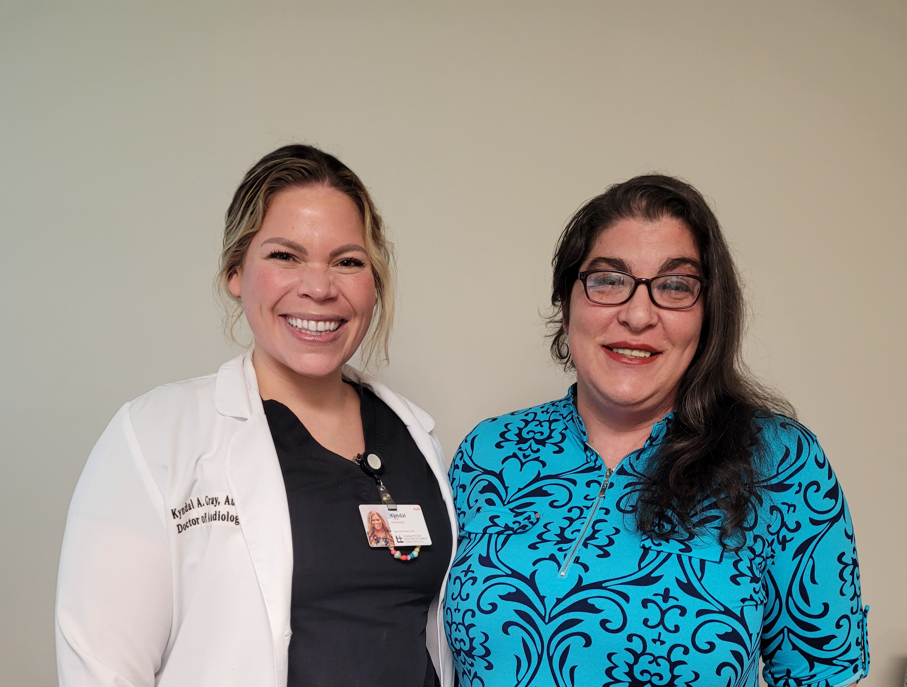 Audiologist Kyndal Gray and patient Allison P.