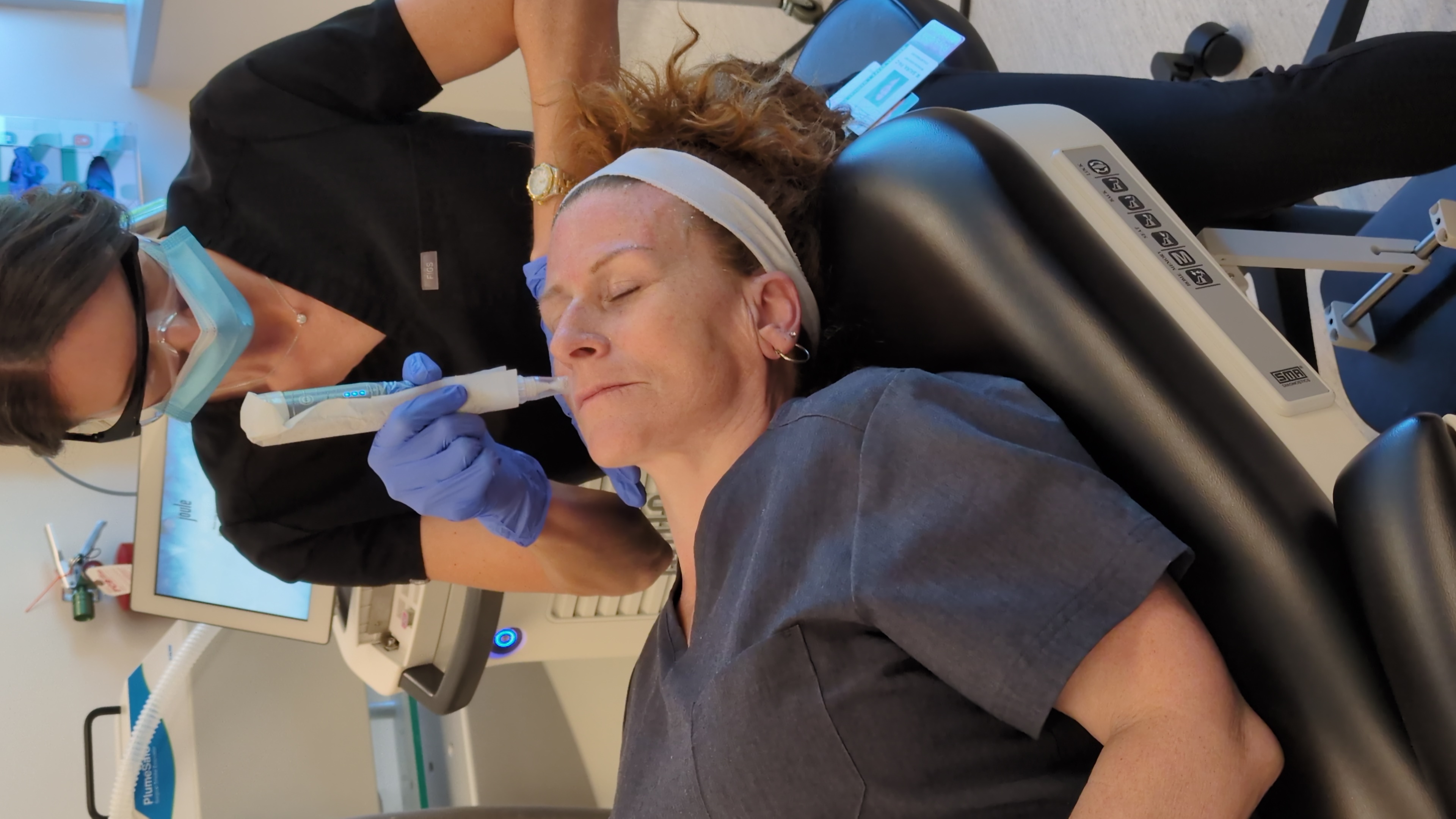 Meg Baura, PA-C, performing a microneedling session with the SkinPen